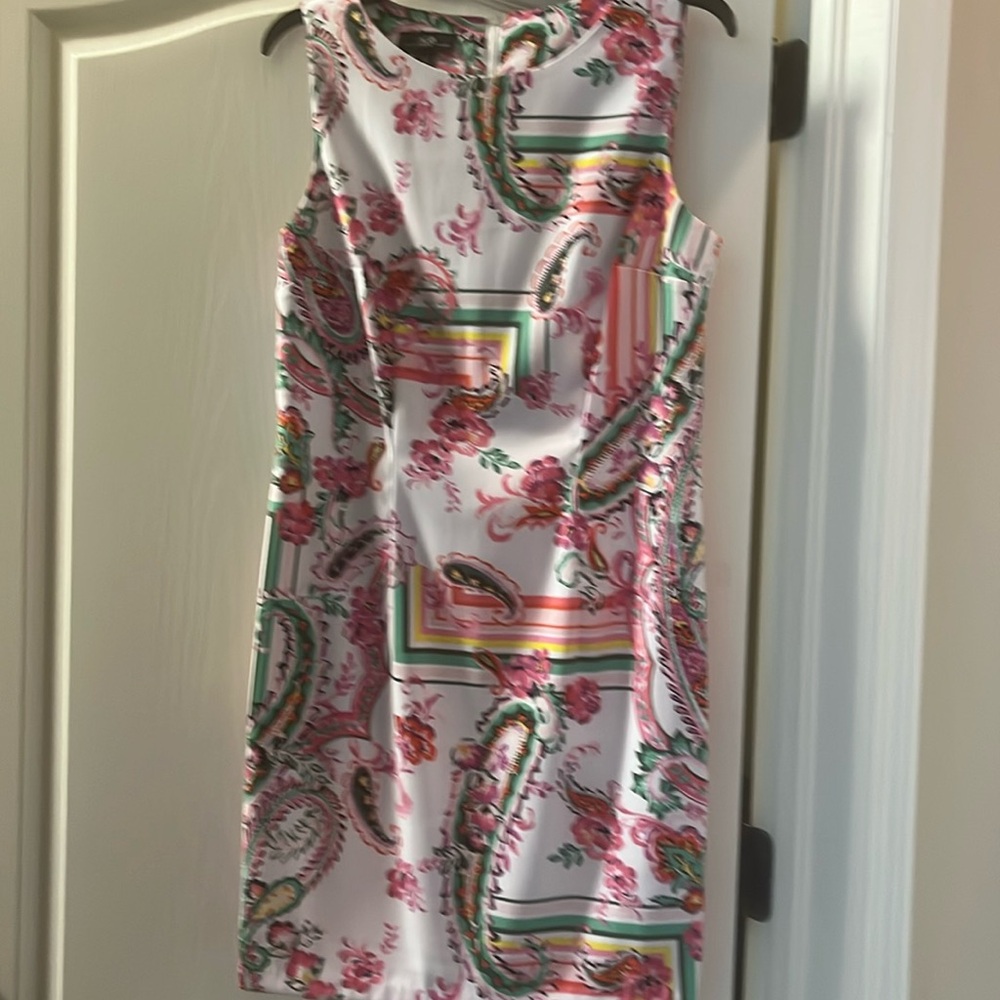 Ladies Dress. White background with decorative bright colors. Great condition.